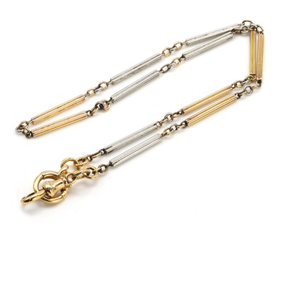 Lot 531 - A two tone gold Albert chain, c.1920s