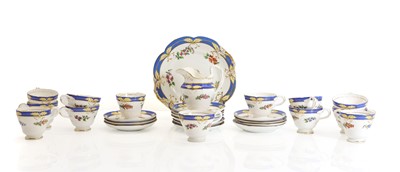 Lot 159 - A blue, gilt and floral part tea service