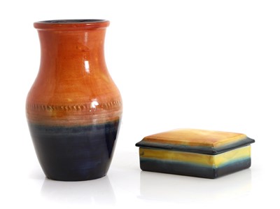Lot 148 - A Moorcroft orange and blue oxide flambe baluster vase
