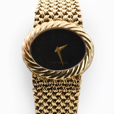Lot 554 - A 9ct gold Bueche Girod mechanical bracelet watch