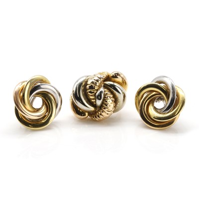 Lot 298 - A pair of three colour gold knot earrings and a similar knot ring