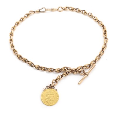 Lot 504 - An antique 9ct gold Albert chain and George III Guinea pendant