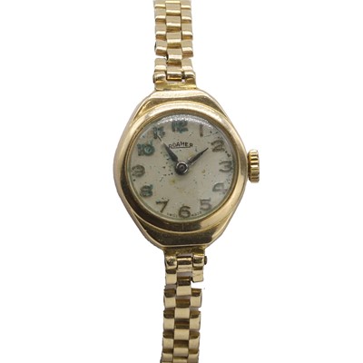 Lot 561 - A 9ct gold Roamer mechanical bracelet watch