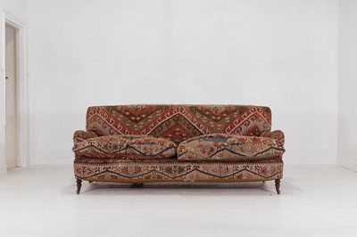 Lot 43 - A kilim-covered sofa by George Smith
