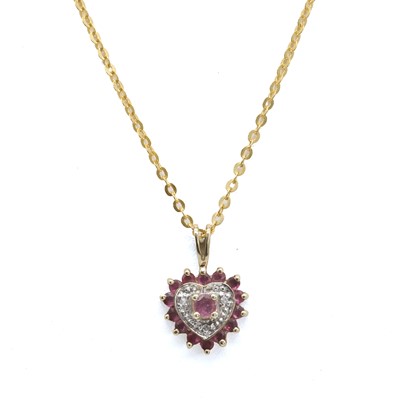 Lot 118 - A 9ct gold ruby and diamond pendant and two pairs of ruby stud earrings