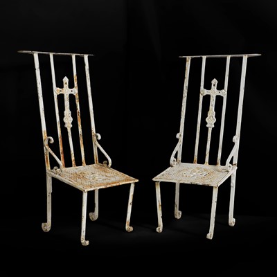 Lot 438 - A pair of wrought-iron prie-dieu chairs