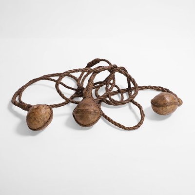 Lot 436 - An animal skin bolas