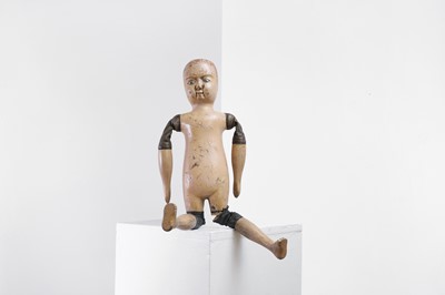 Lot 160 - A primitive carved and polychrome wooden doll