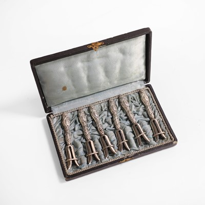 Lot 439 - A set of six white metal quail leg holders