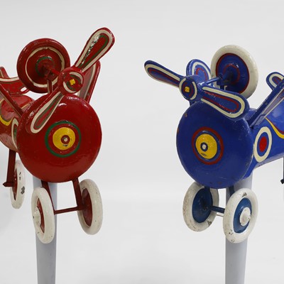 Lot 72 - A pair of aeroplane 'dobby' fairground rides