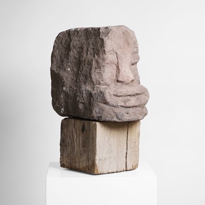 Lot 139 - An apotropaic carved stone head