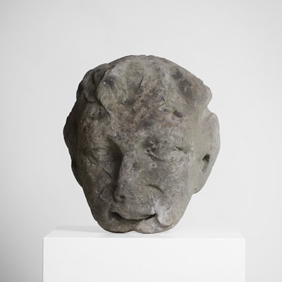 Lot 138 - A carved stone head of Pan