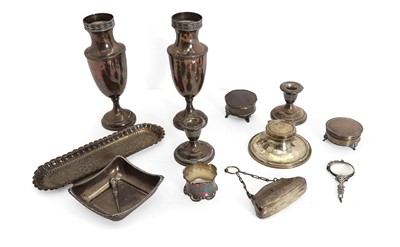 Lot 49 - A pair of silver vases