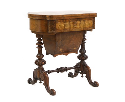 Lot 442 - A Victorian walnut games table