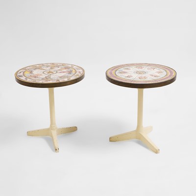 Lot 427 - A pair of tiled side tables