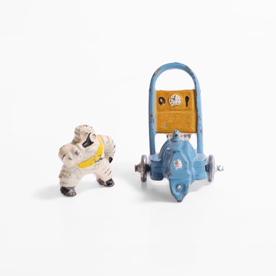Lot 464 - A miniature lead Michelin Man