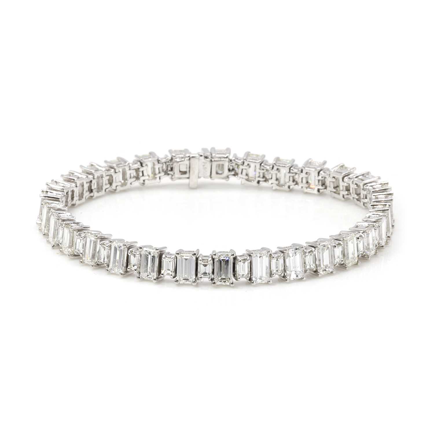 Lot 231 - A platinum and diamond line bracelet