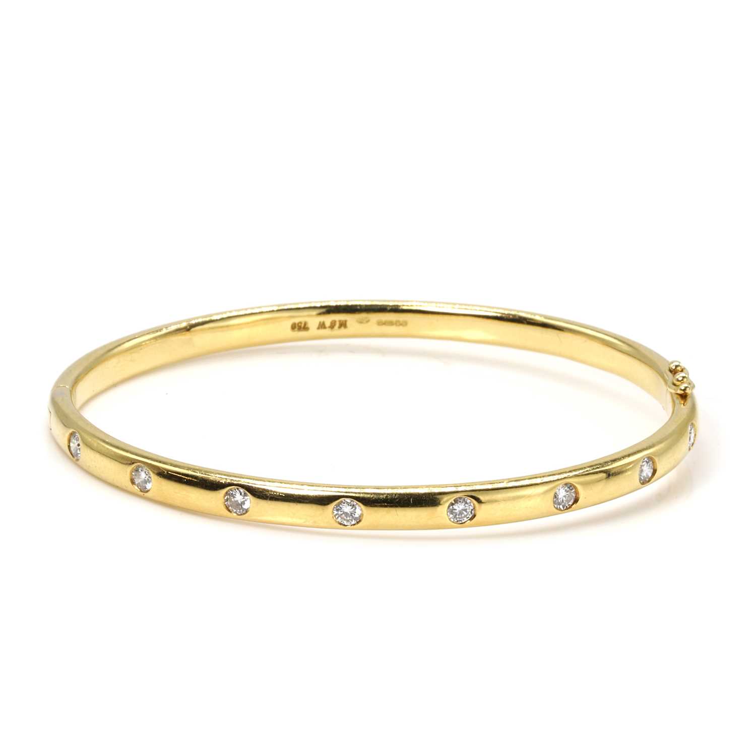 Lot 208 - An 18ct gold diamond bangle, by Mappin & Webb
