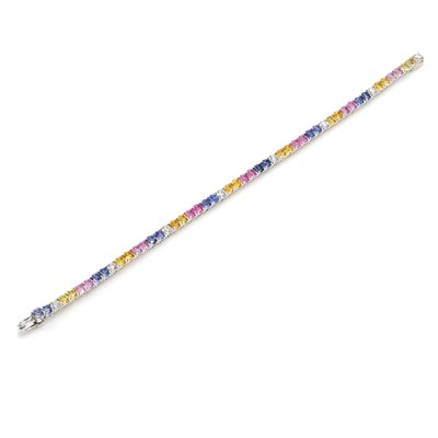 Lot 239 - A vari-coloured sapphire and diamond tennis bracelet