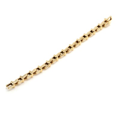 Lot 176 - An 18ct gold T chain bracelet, by Tiffany & Co.