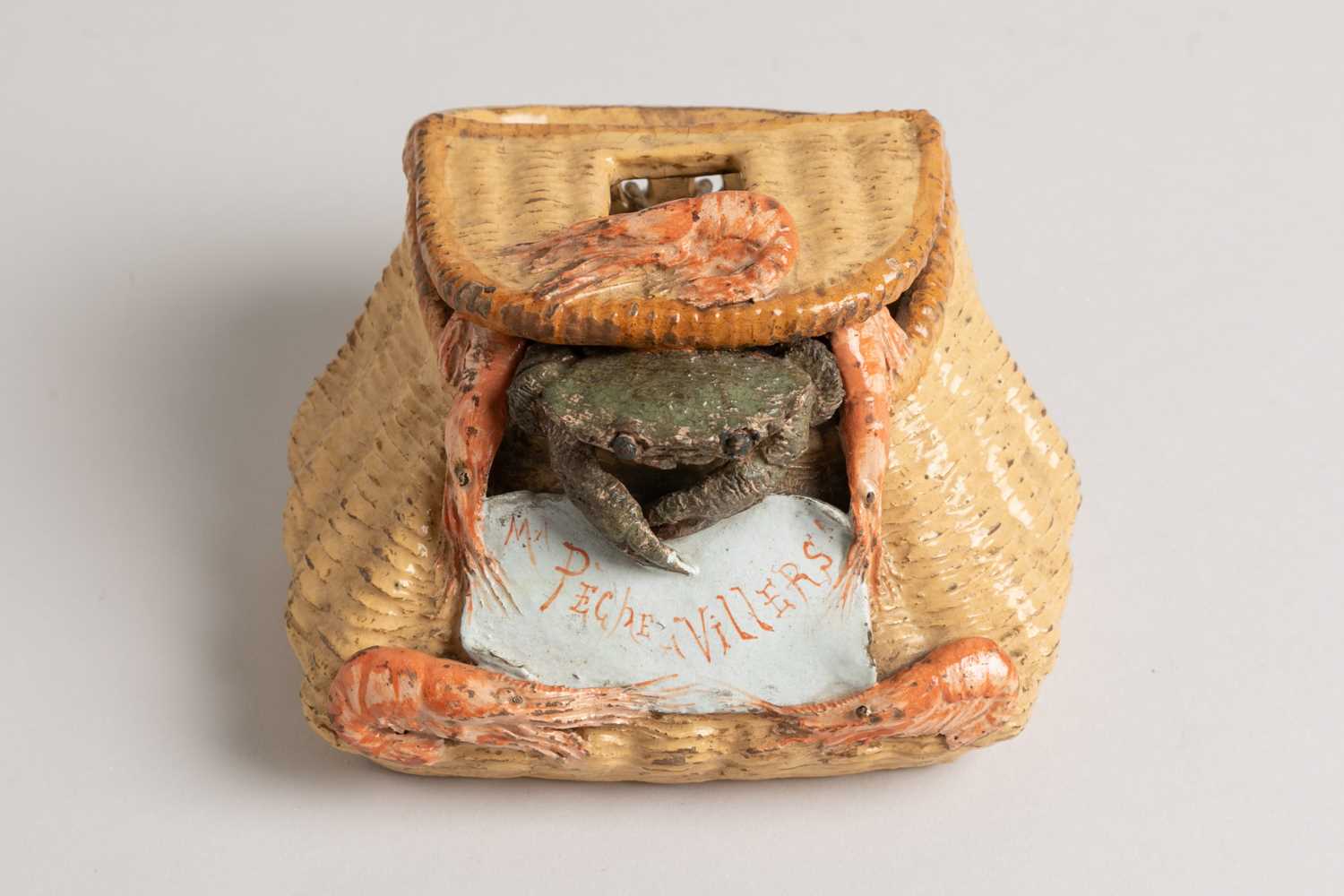 Lot 215 - A glazed pottery wall pocket or salt box