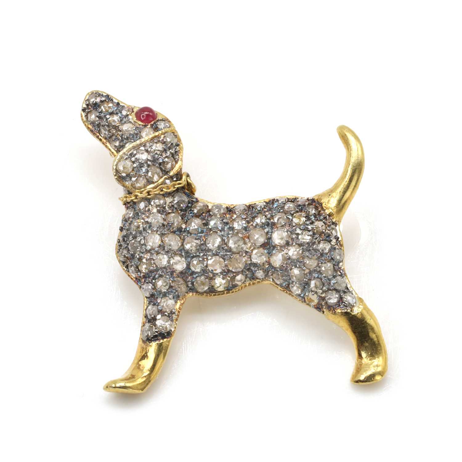 Lot 274 - A diamond and gemstone set dog brooch