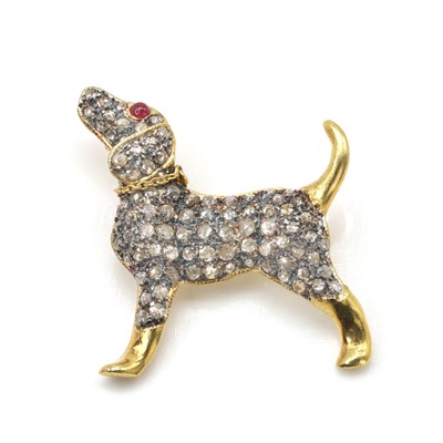 Lot 274 - A diamond and gemstone set dog brooch