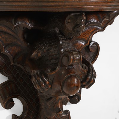 Lot 58 - An oak Arts & Crafts carved wall bracket