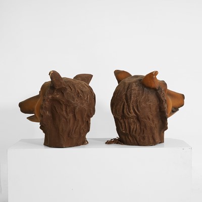 Lot 75 - A pair of papier mâché bear heads