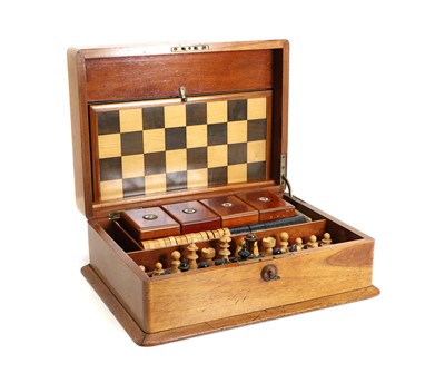 Lot 275 - A mahogany cased games compendium