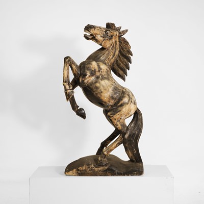 Lot 102 - A carved polychromed sculpture of a horse