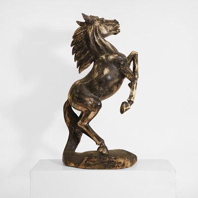 Lot 102 - A carved polychromed sculpture of a horse
