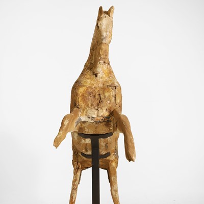Lot 104 - A primitive galloper on stand