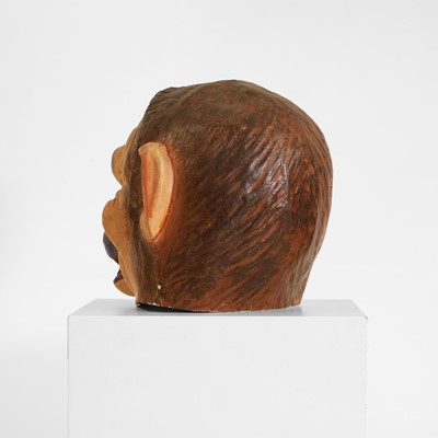Lot 77 - A papier mâché monkey-man head