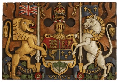 Lot 121 - A polychromed and carved wooden coat of arms