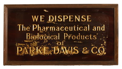 Lot 372 - A Chemist's reverse-painted glass sign