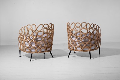 Lot 551 - A pair of rattan 'Ella' lounge chairs by Paolo Moschino