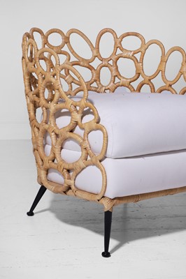 Lot 551 - A pair of rattan 'Ella' lounge chairs by Paolo Moschino