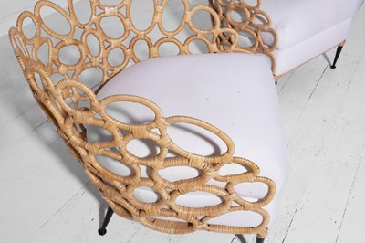Lot 551 - A pair of rattan 'Ella' lounge chairs by Paolo Moschino