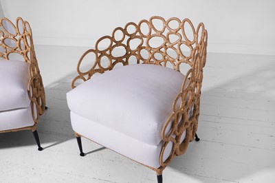 Lot 551 - A pair of rattan 'Ella' lounge chairs by Paolo Moschino
