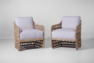 Lot 569 - A pair of rattan 'Thea' lounge chairs by Paolo Moschino