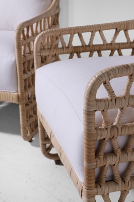 Lot 569 - A pair of rattan 'Thea' lounge chairs by Paolo Moschino
