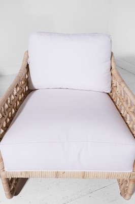 Lot 569 - A pair of rattan 'Thea' lounge chairs by Paolo Moschino