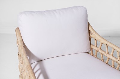 Lot 569 - A pair of rattan 'Thea' lounge chairs by Paolo Moschino