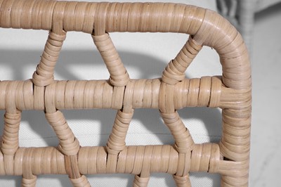 Lot 569 - A pair of rattan 'Thea' lounge chairs by Paolo Moschino