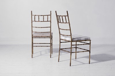 Lot 543 - A set of eight gilt-metal faux bamboo dining chairs