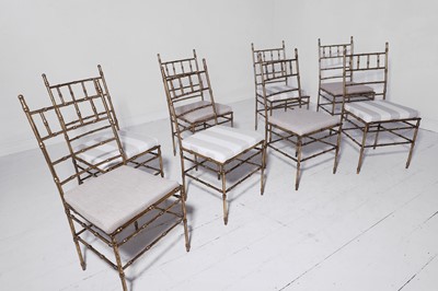 Lot 543 - A set of eight gilt-metal faux bamboo dining chairs