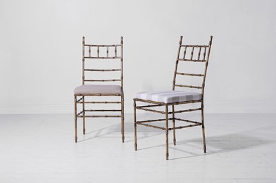 Lot A set of eight gilt-metal faux bamboo dining chairs