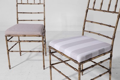 Lot 543 - A set of eight gilt-metal faux bamboo dining chairs