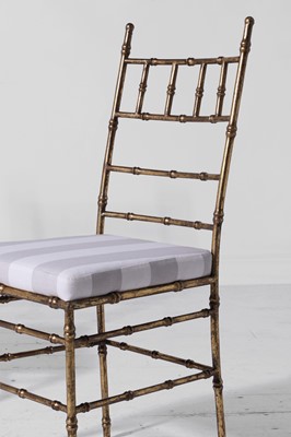 Lot 543 - A set of eight gilt-metal faux bamboo dining chairs